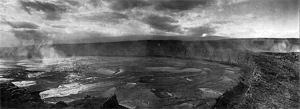A view of the lava lake within Halema`uma`u Crater on December 27, 1911, with Uwekahuna bluff (where HVO and the Jaggar Museum now stand) and Mauna Loa in the background. The lake level had risen about 120 m (400 ft) since October 1911 and will drop 90 m (300 ft) in January, 1912, the month that HVO was founded by Thomas A. Jaggar's arrival for duty. 