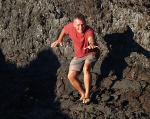 Frank Burgess lava surfing at Muliwai O Pele, Hawai Volcanoes National Park: Photo by Donnie MacGowan