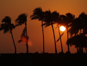 A Vog-Tinted Sunset from the Kailua Pier, Kailua Kona, Hawaii Photo by Donnie MacGowan