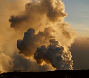 Littoral Explosions at Waikupanaha as molten lava enters the sea; Kilauea Volcano, Hawaii: Photo by Donnie MacGowan